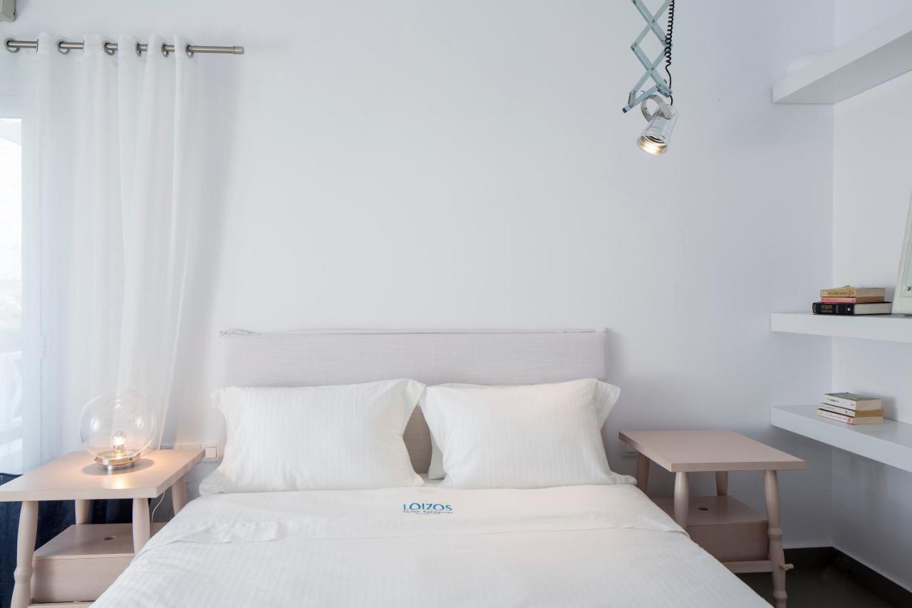 Loizos Stylish Residences Тира Номер фото